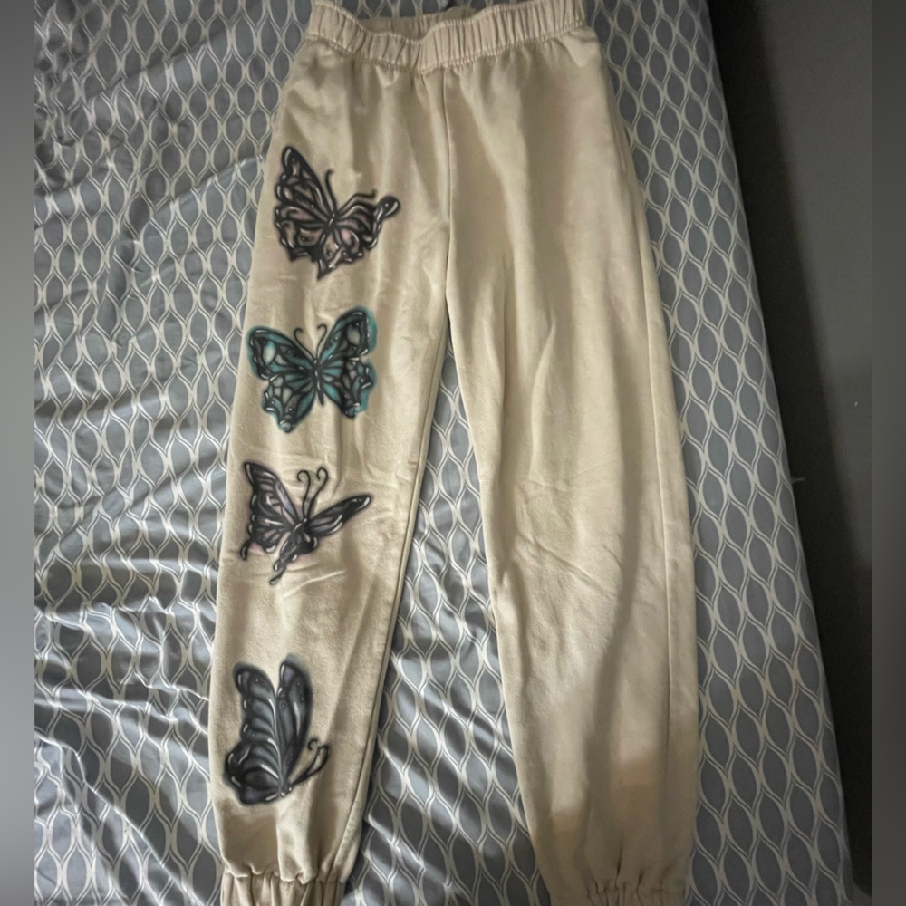 Cream butterfly sweatpants